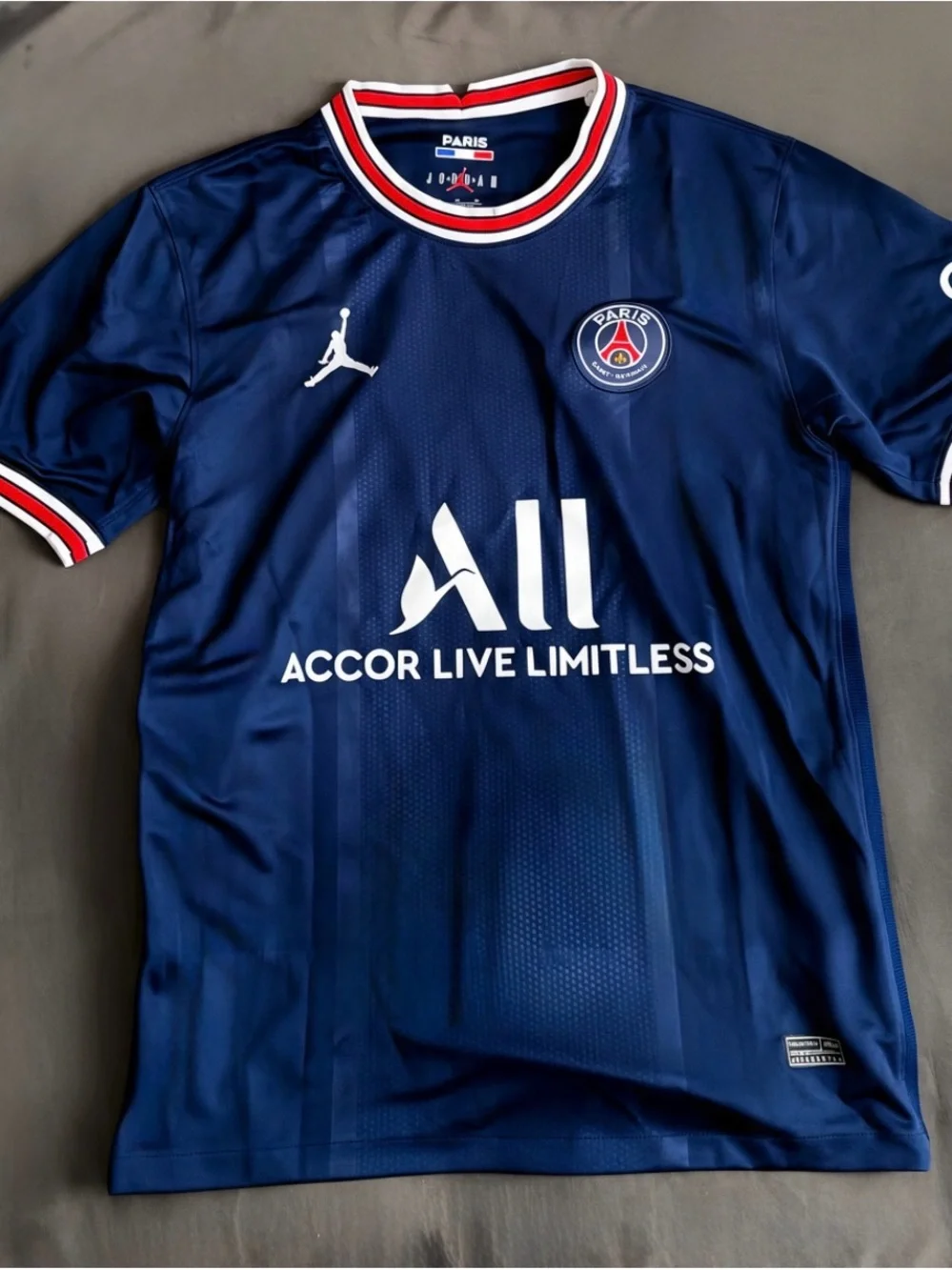Jordan Navy Blue Paris Saint-Germain Soccer Jersey with Red & White Trim